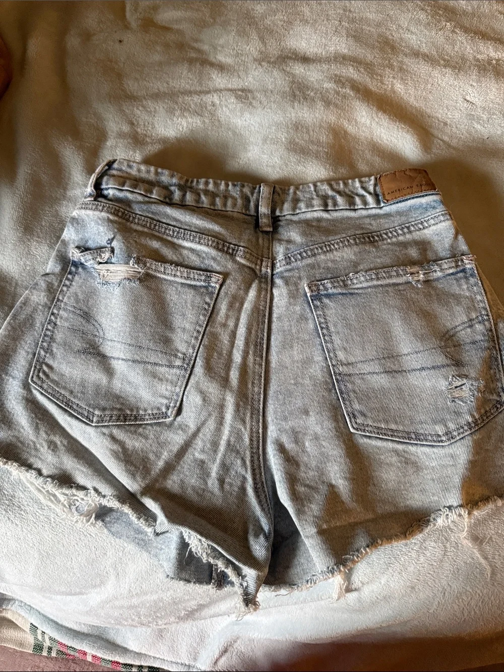 Distressed Light Wash Denim Shorts